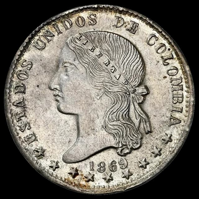Imagen orientativa: 1 peso Estados Unidos de Colombia 1868-1871 (cabeza de la Libertad)